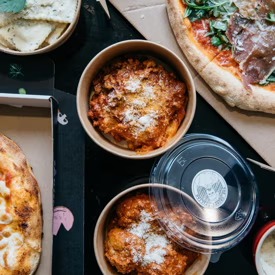 Wood-fired pizza and Nonna's meatballs from The Grumpy Italian Leichhardt — a short drive from Annandale